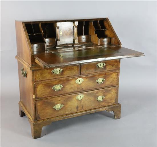 A mid 18th century featherbanded walnut bureau, W.3ft 1in. D.1ft 10in. H.3ft 4in.